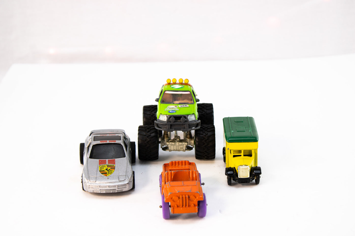 Vintage Die-Cast Toy Car Lot – Monster Truck, Jeep, Delivery Van & Turbo Car